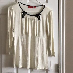 3 quarter length sleeve cream colored top